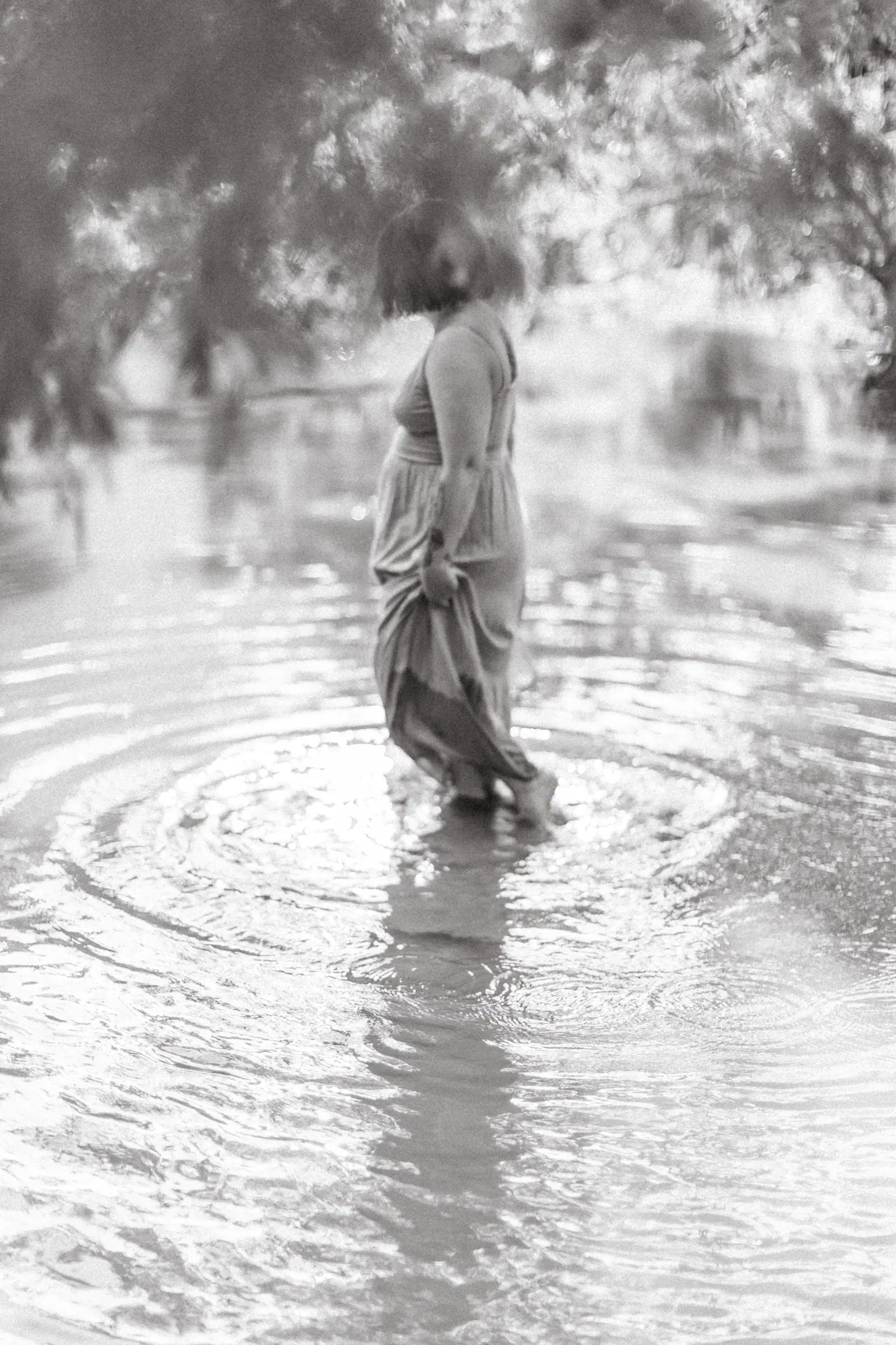 Soulful river portrait of a woman in the Texas Hill Country by Sara James
