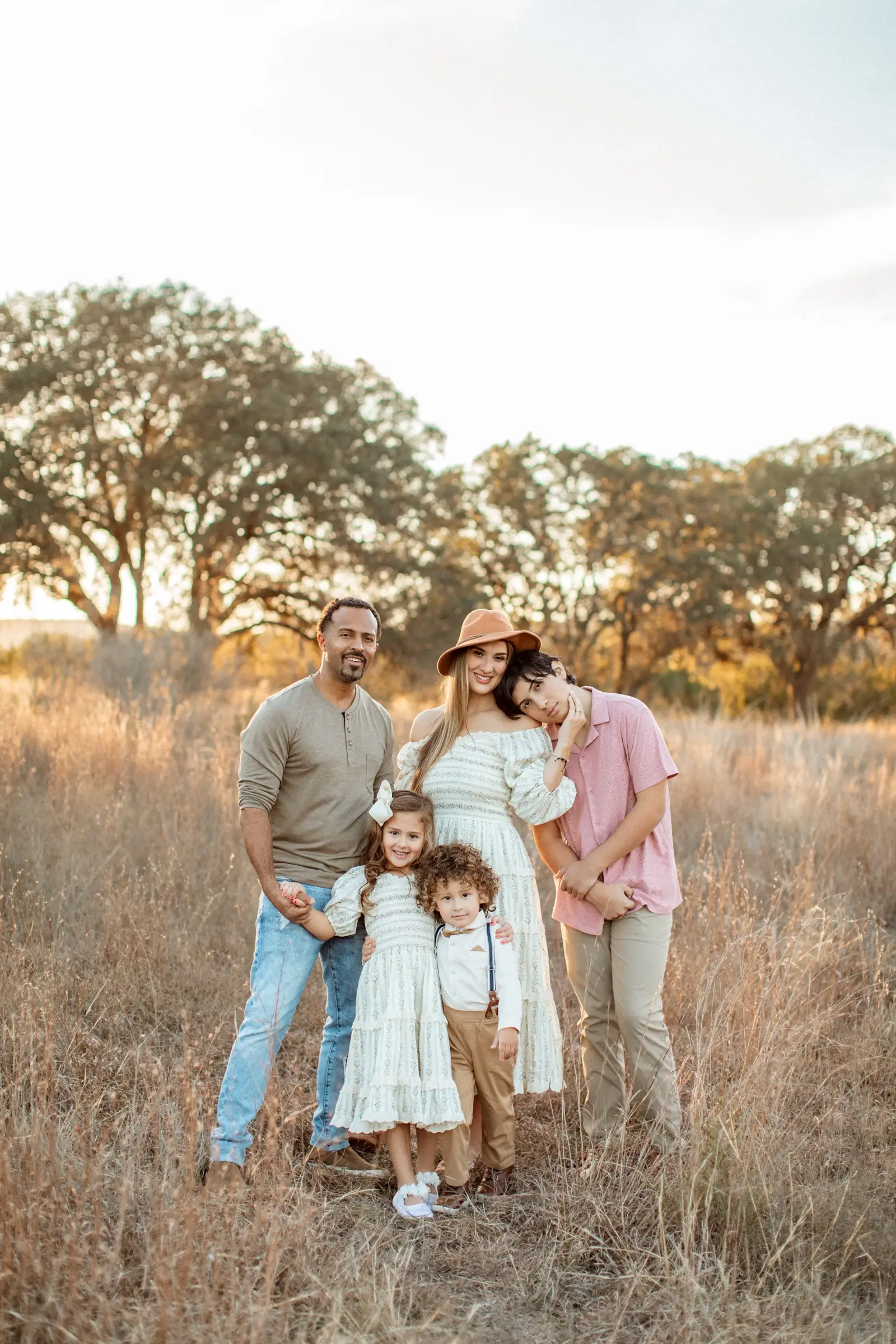 Golden-hour family portrait in the Texas Hill Country by Sara James